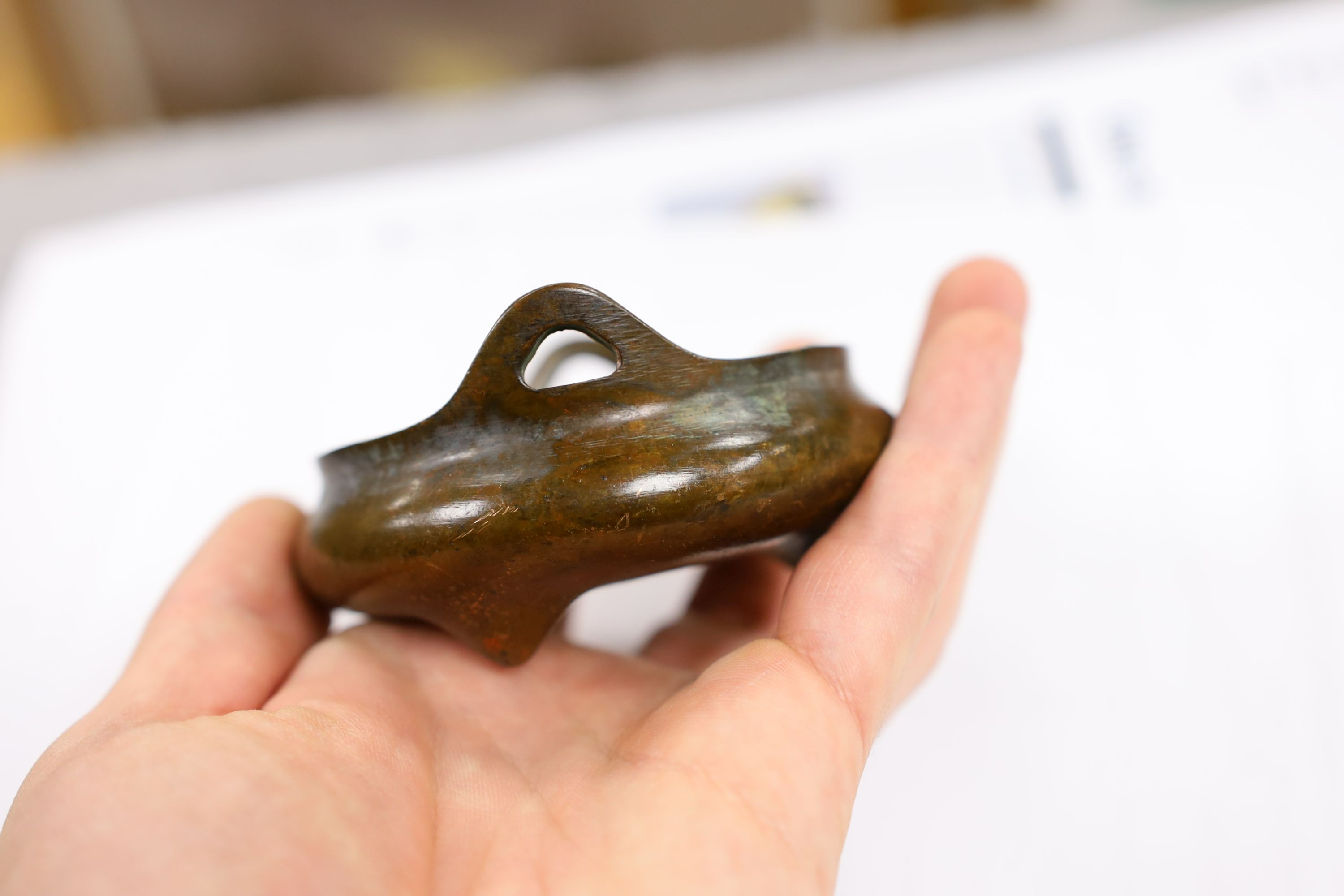 Two Chinese bronze censers, largest 11cms diameter